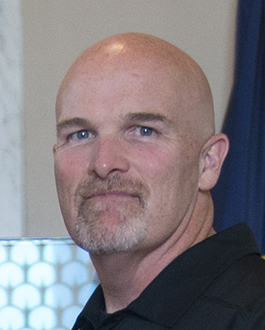 Dan Quinn, June 16, 2017, during an Atlanta Falcons visit to Arlington National Cemetery. Archival photograph; not a current Commanders personnel decision.