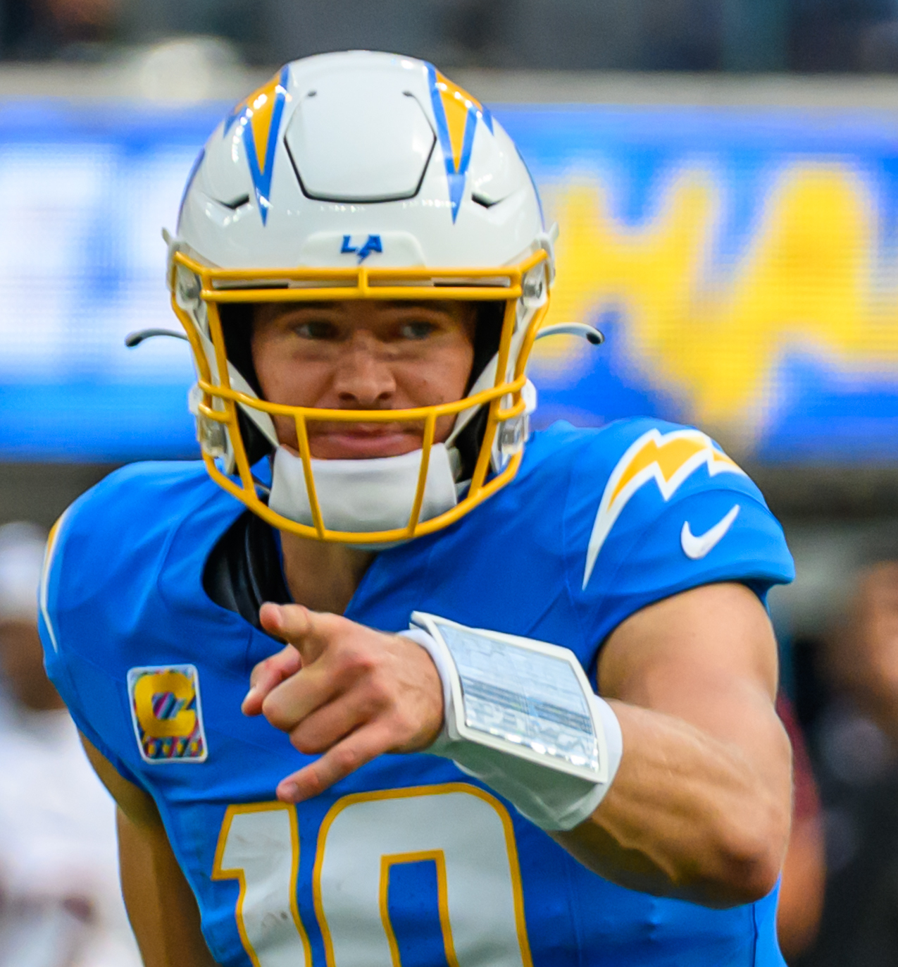 Justin Herbert, archival 2025 Chargers photograph. The quarterback is shown; this does not depict Gillotte or the 2026 contact.